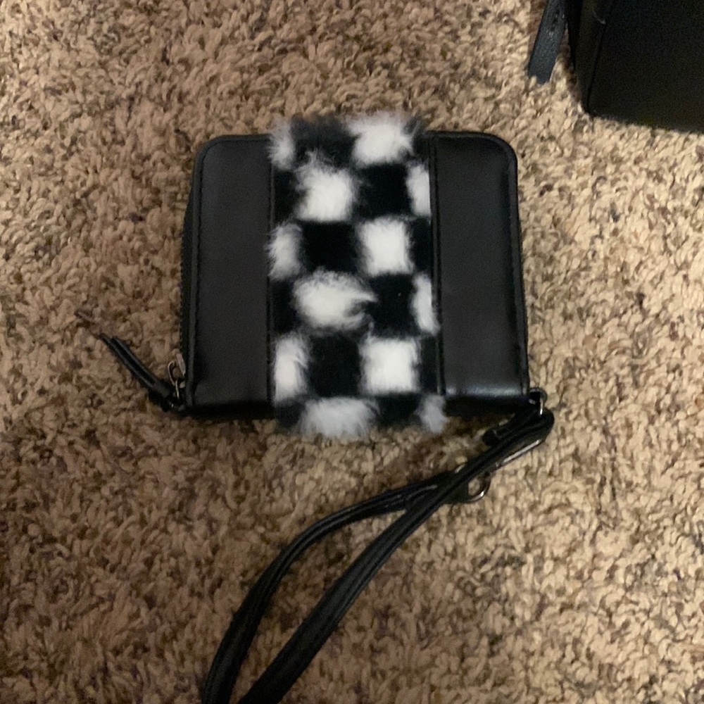 Black pleather zip/snap small wristlet with fuzzy checkered flag on front